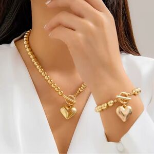 Geovanni-Vintage Set. Gold Heart Pendant With Choker(plastic)Necklace&Bracelet